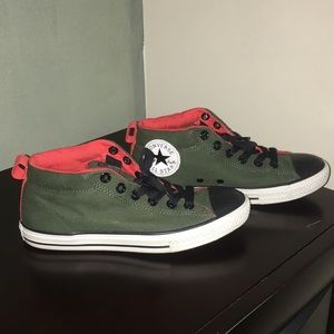 Deep olive and orange converse sneakers